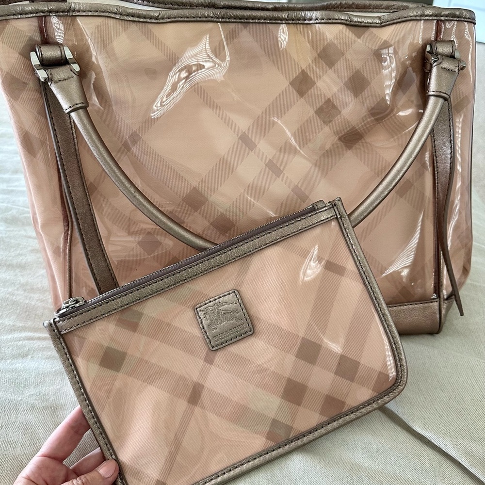 Unique Burberry tote bag with matching zippered pouch that snaps in. Pink plaid.